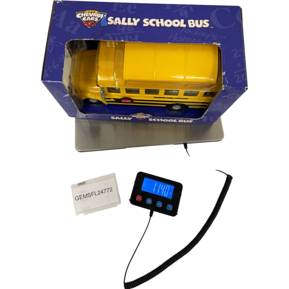 2001The Chevron Cars Sally School Bus Plastic Yellow Collectible Model Car NEW
